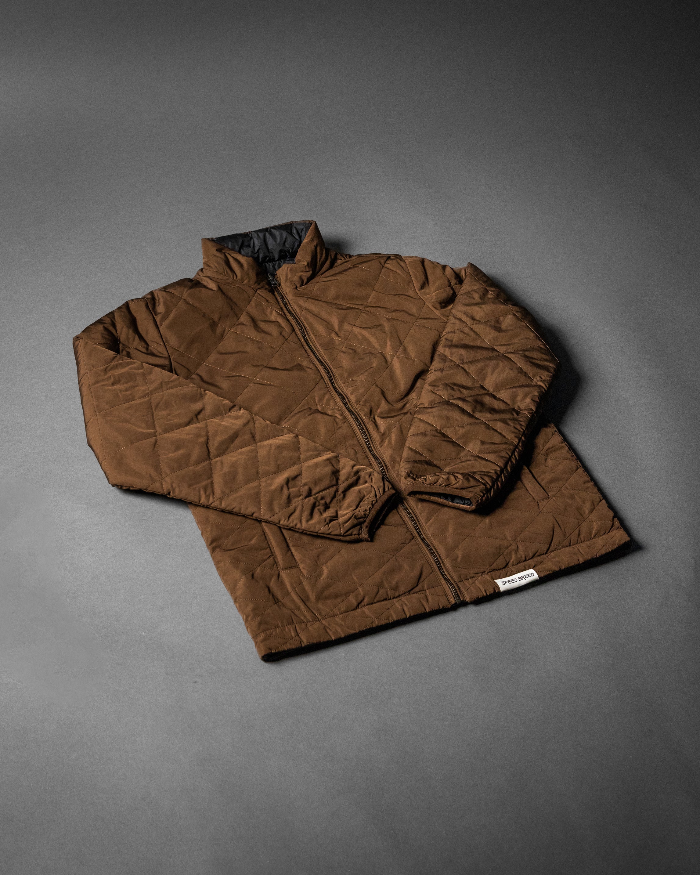 SPEED BREED PREMIUM REVERSIBLE QUILTED PUFFER JACKET (Mocha/Ebony)