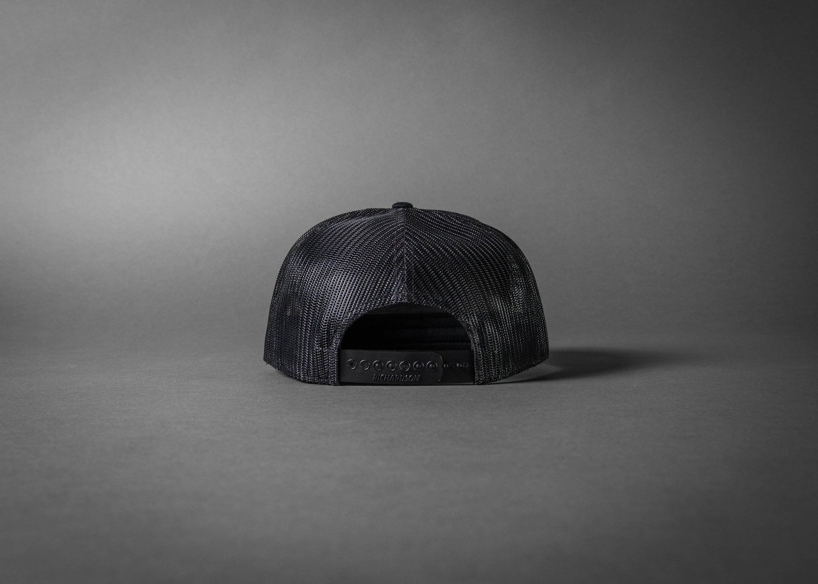 HIVERANNO MOUNTAINEER (Black/Black Premium 7-Panel Trucker Hat)