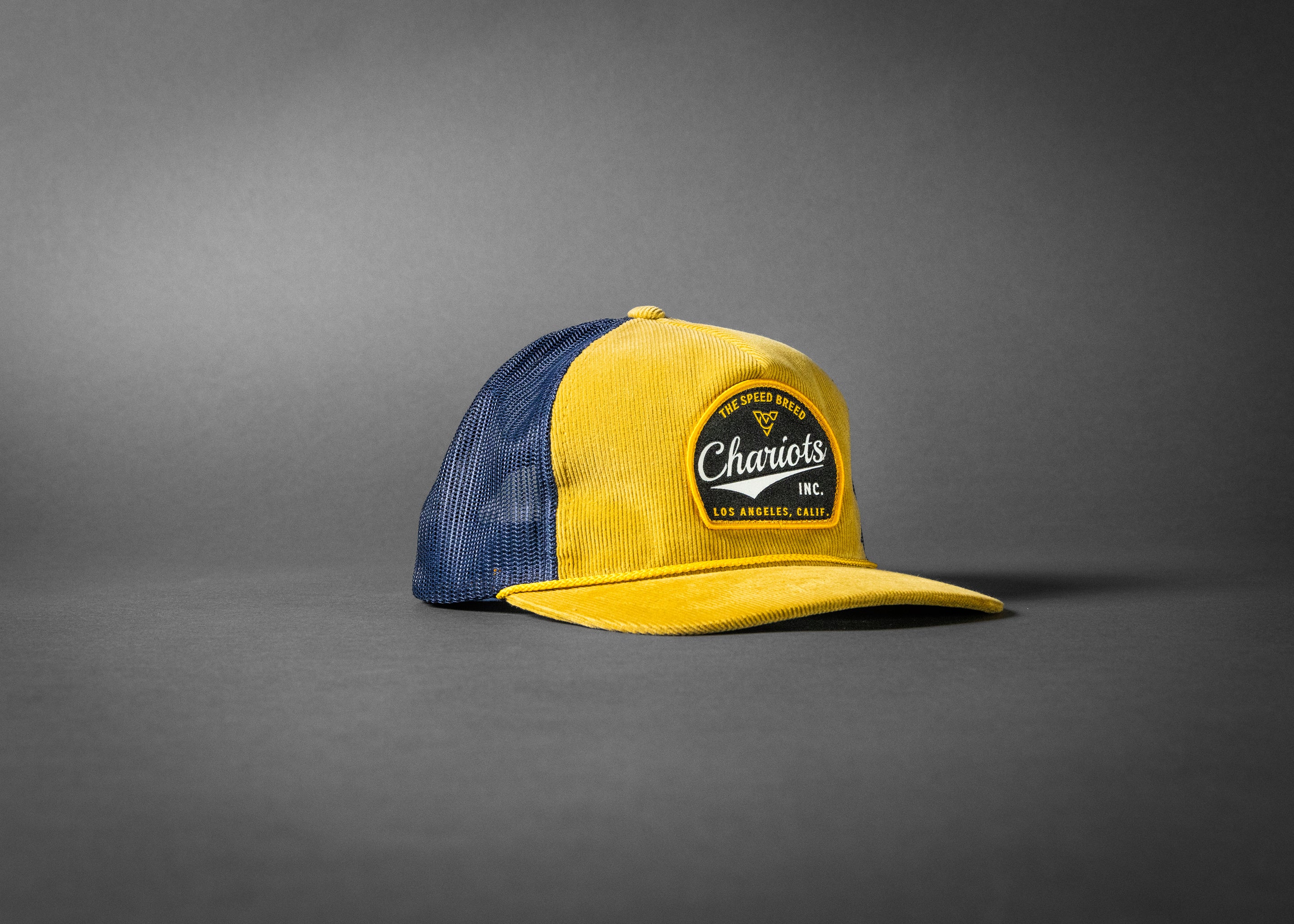 YELLOWJACKET (Amber Gold/Navy Corduroy Trucker Hat)