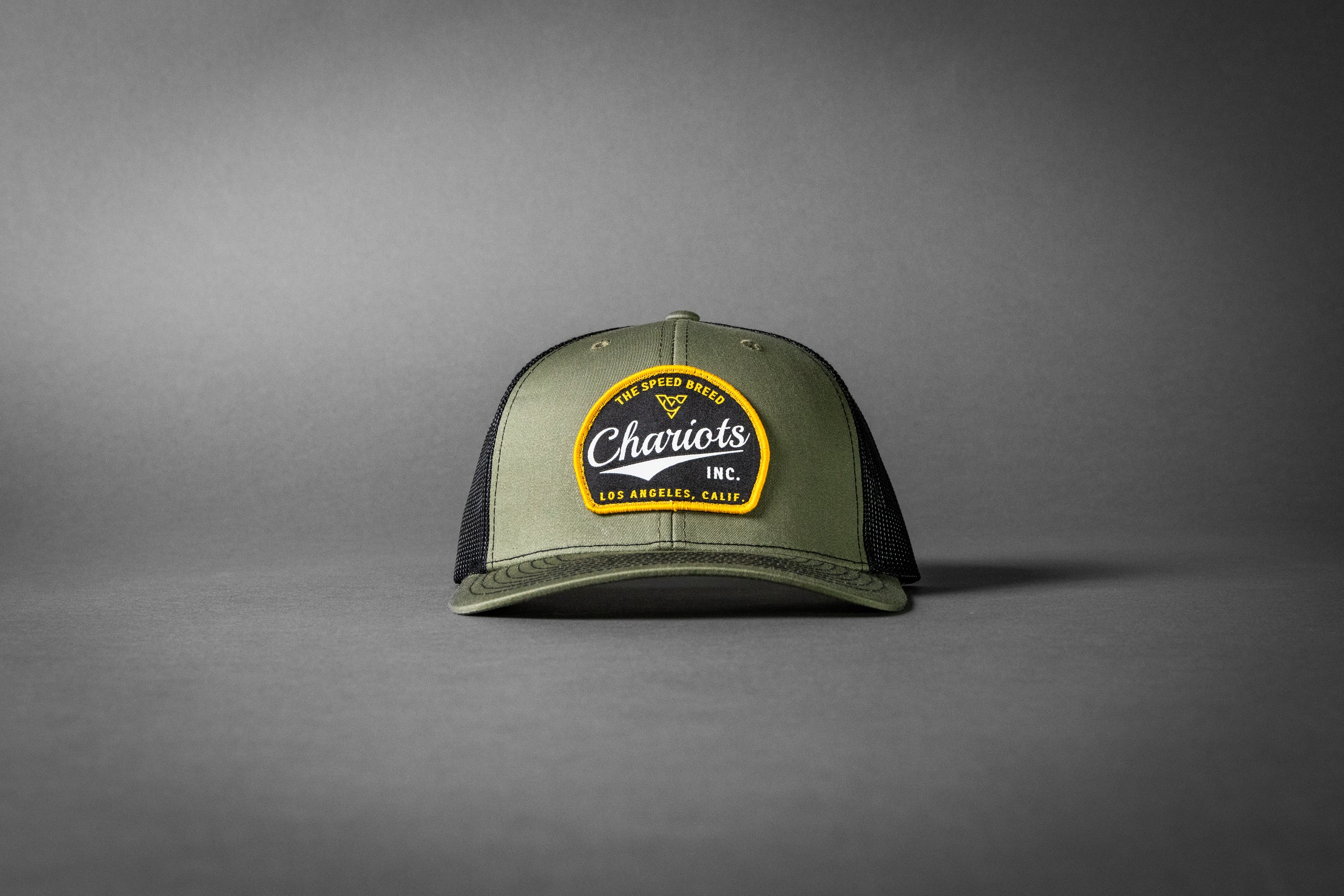 YELLOWJACKET (Loden Green/Black Premium Trucker Hat)