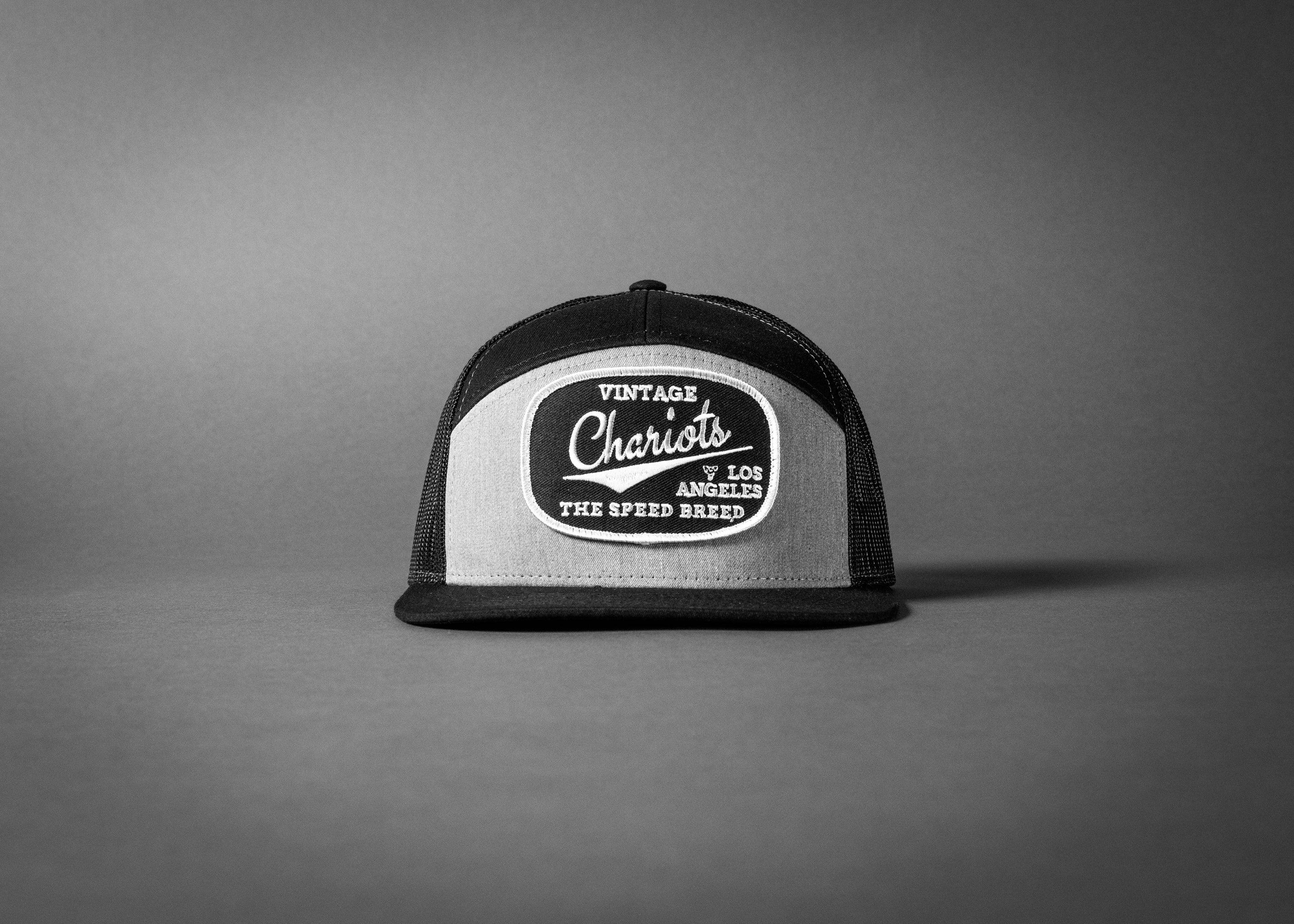 CHARIOTS (Heather Grey/Black Premium 7-Panel Trucker Hat)