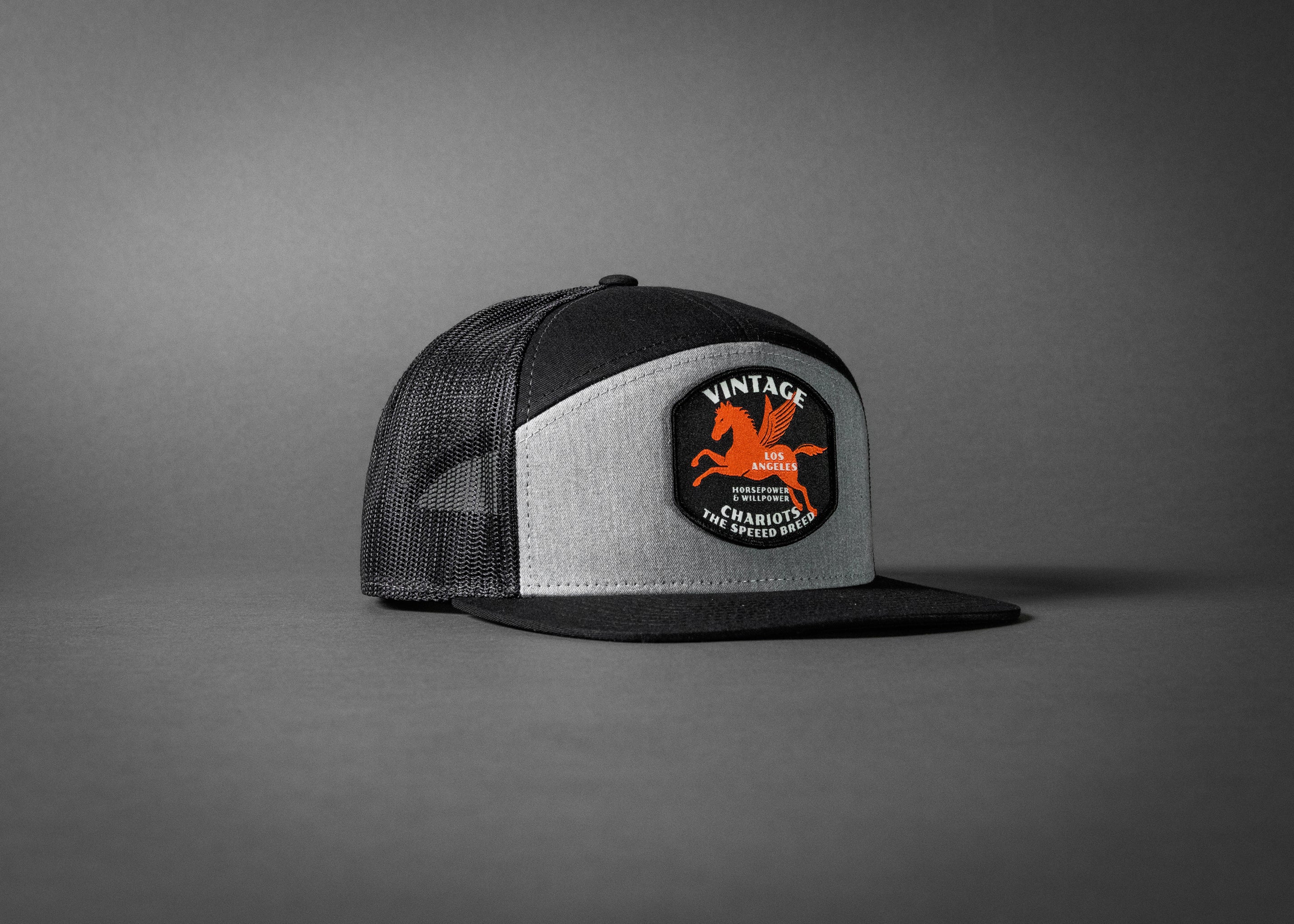 PEGASUS (Heather Grey/Black Premium 7-Panel Trucker Hat)