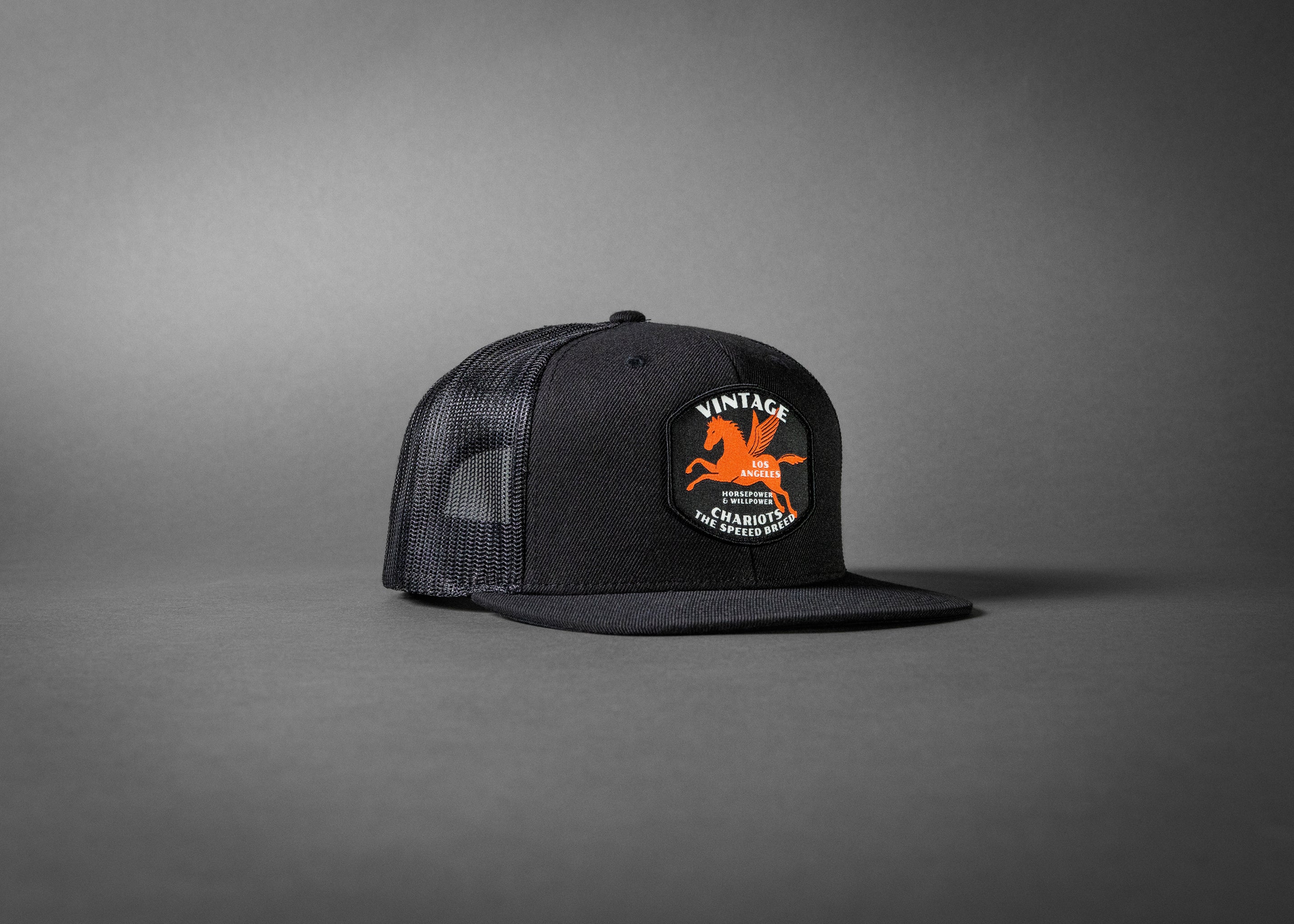 PEGASUS (Black Wool/Black Mesh Flat Bill Trucker Hat)