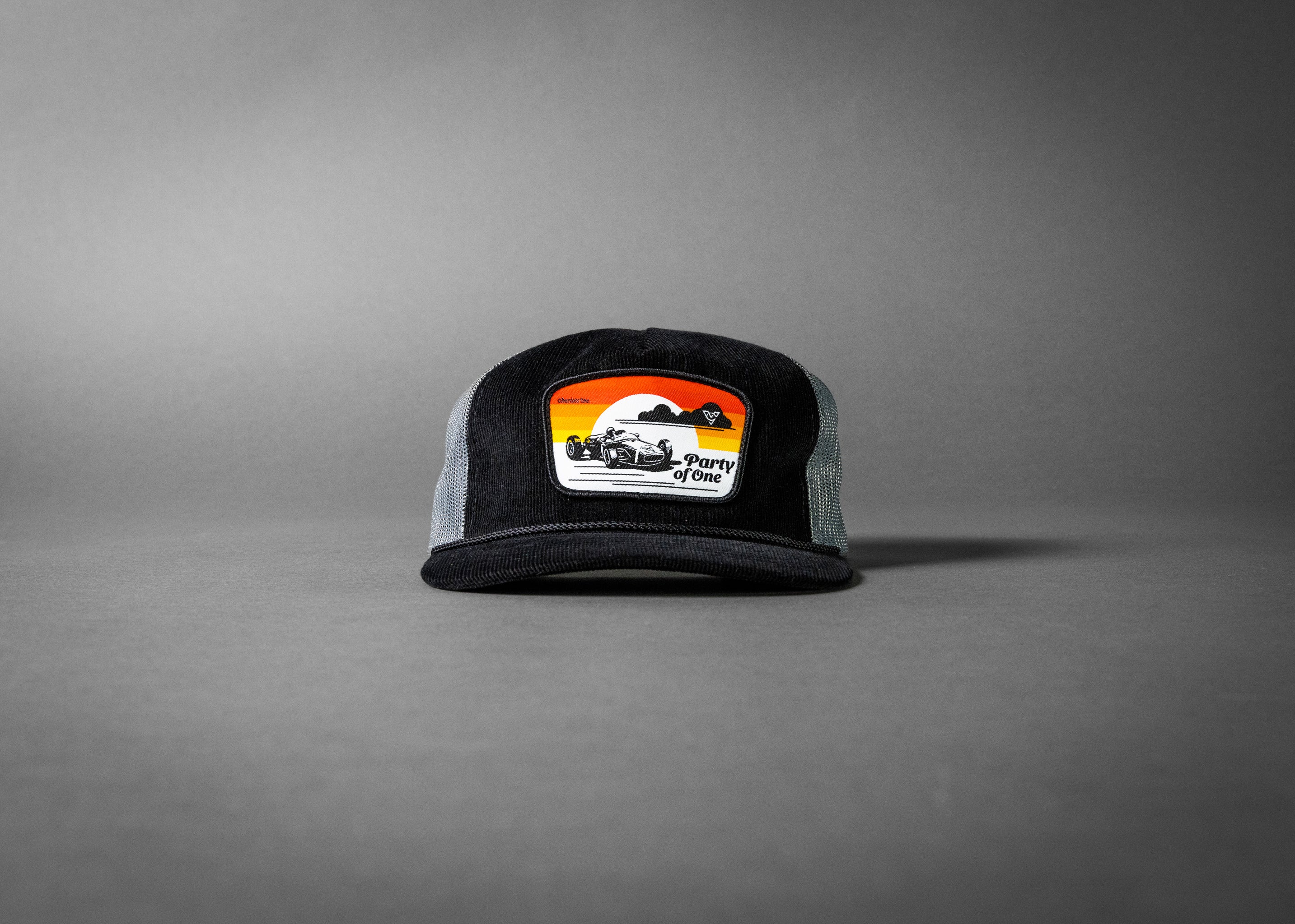 PARTY OF ONE (Black/Charcoal Corduroy Trucker Hat)