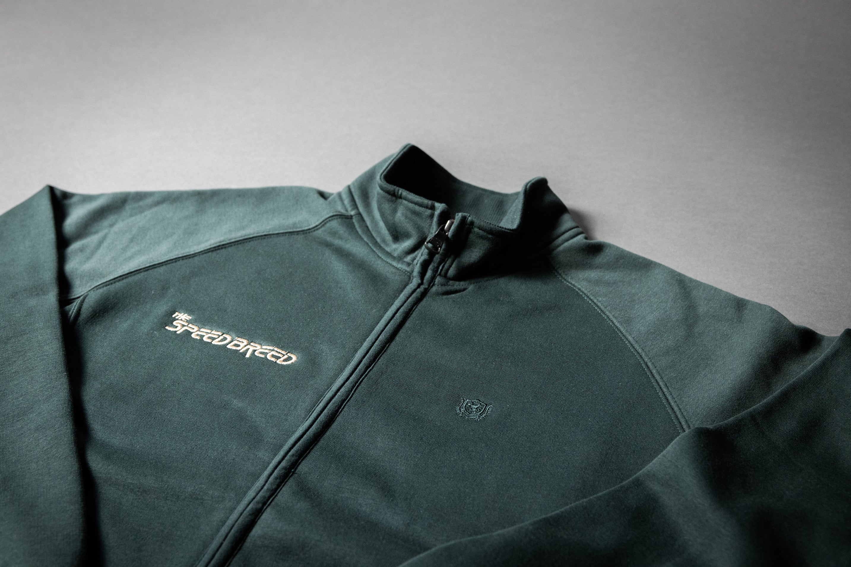 SPEED BREED PREMIUM FULL-ZIP TRACK JACKET (Hunter Green/Light Gold)