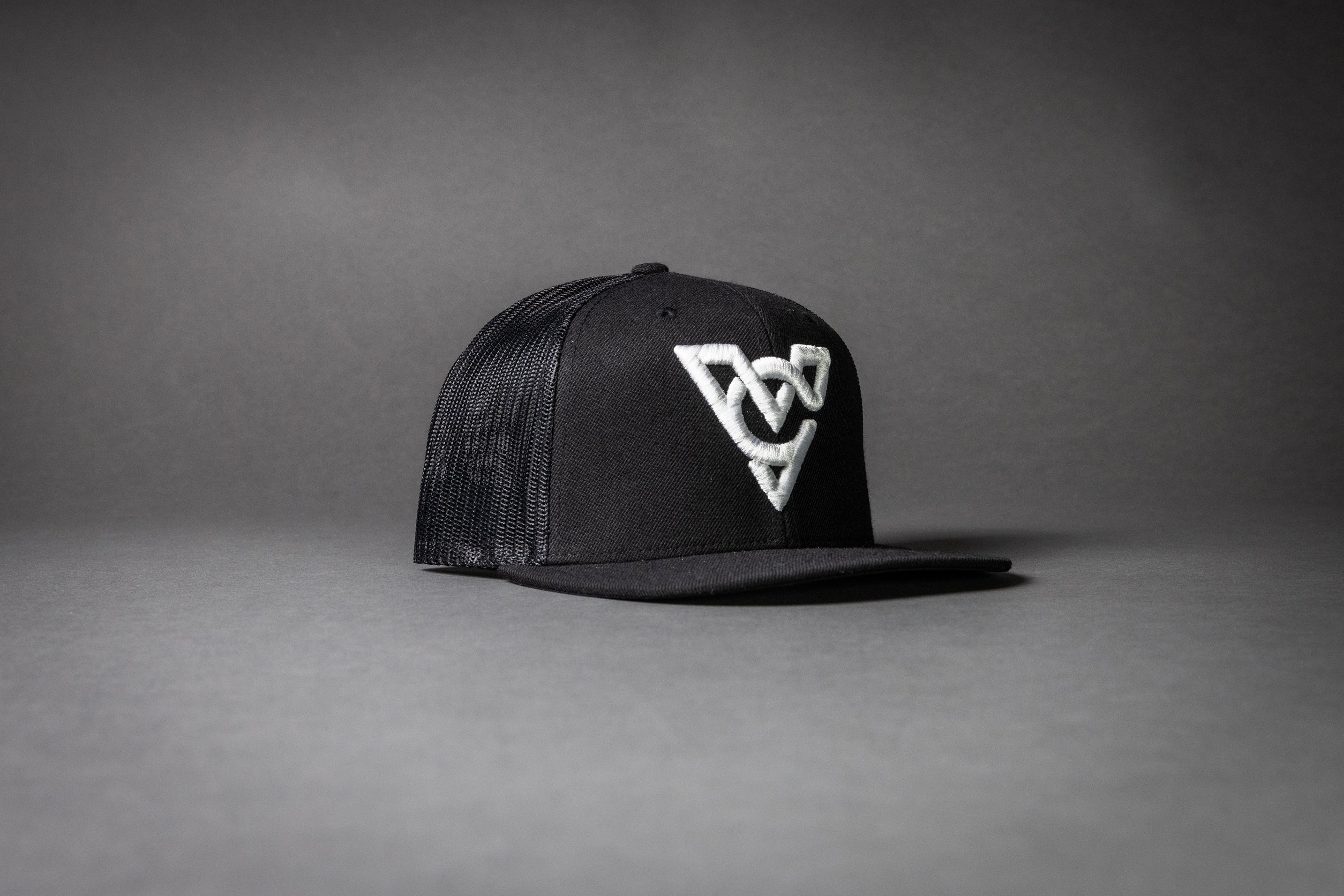 VC WOOL BLEND FLATBILL TRUCKER HAT (Black/Black/White Puff)