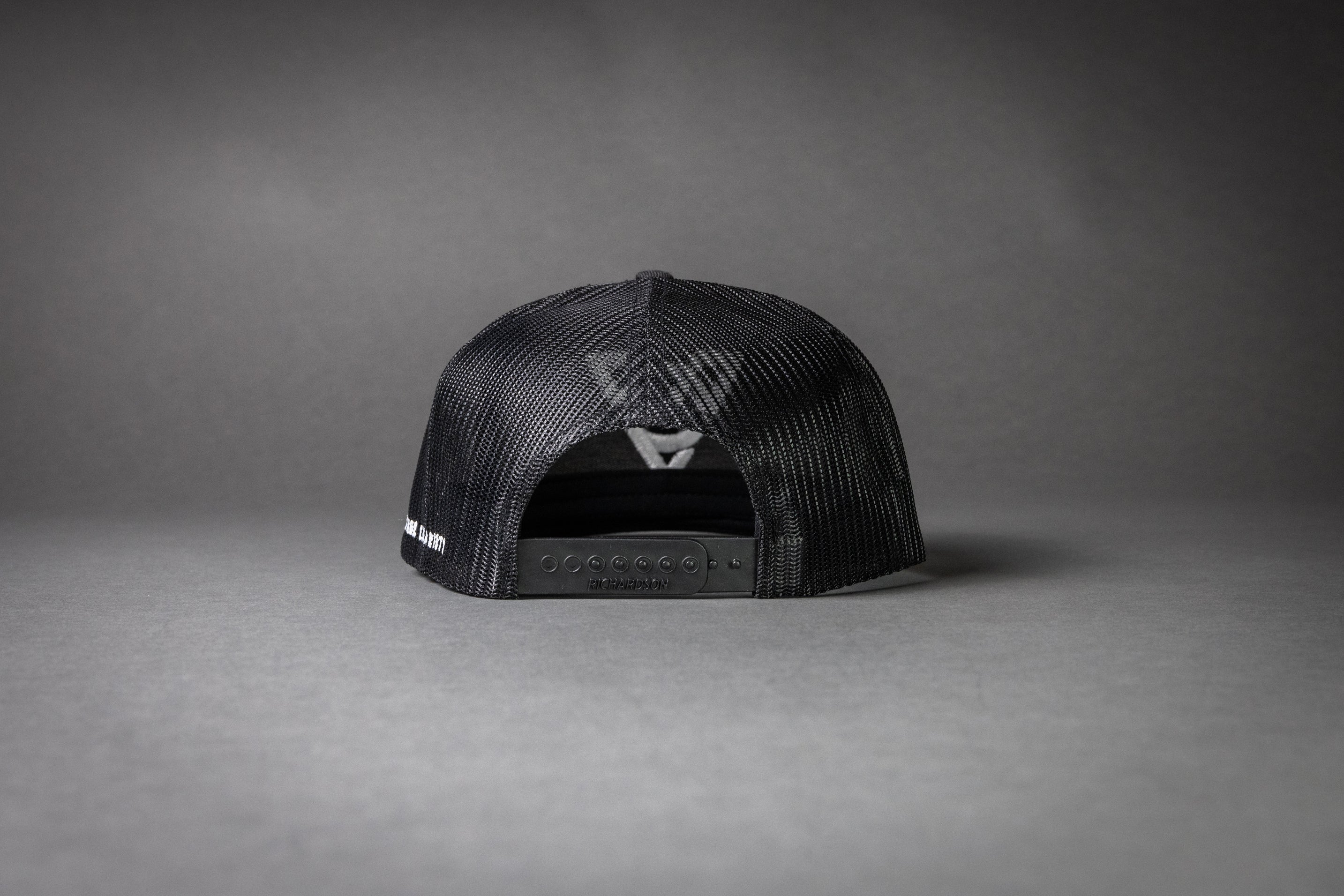 VC WOOL BLEND FLATBILL TRUCKER HAT (Black/Black/White Puff)