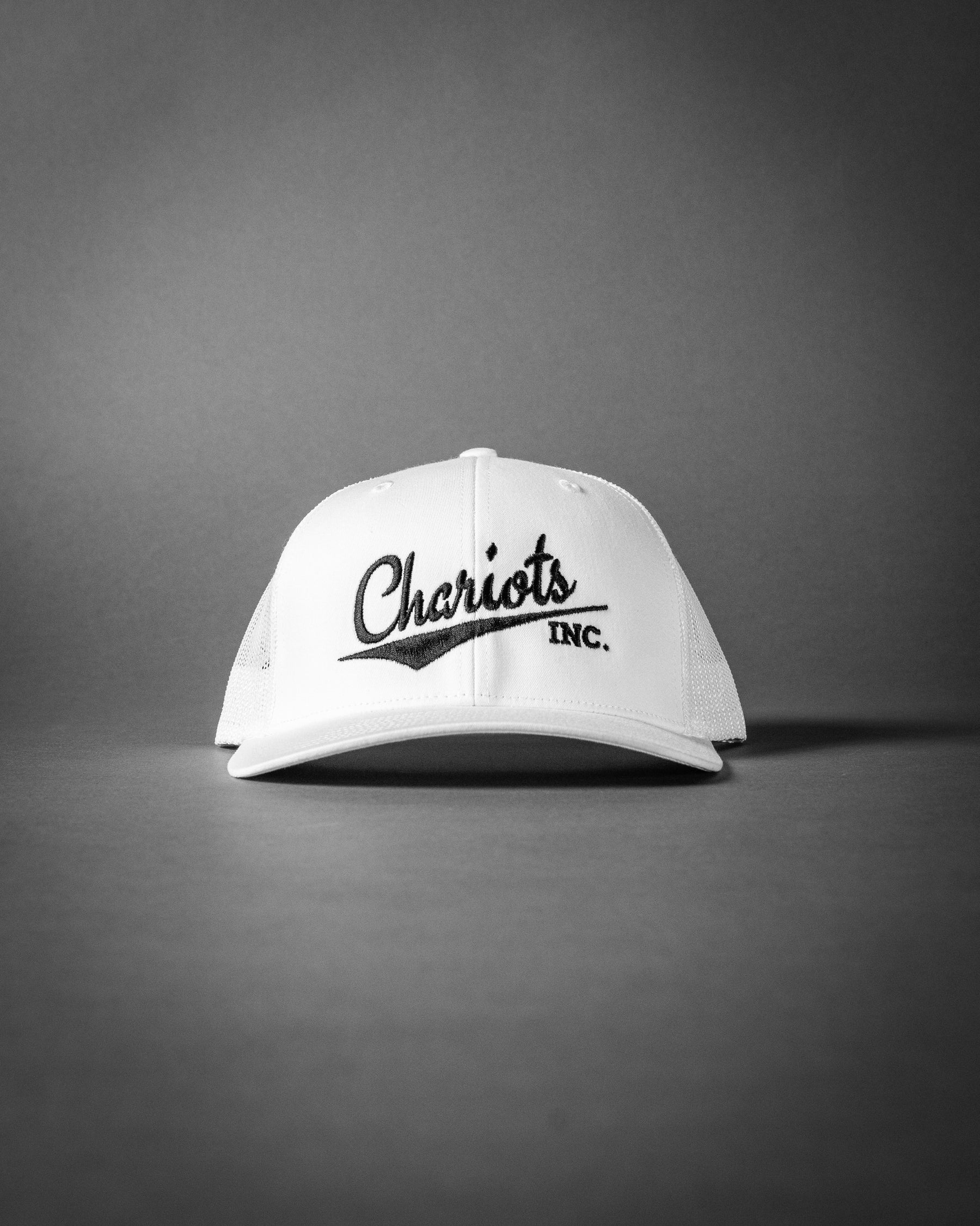 CHARIOTS INC (White/Black Embroidered Premium Trucker Hat)