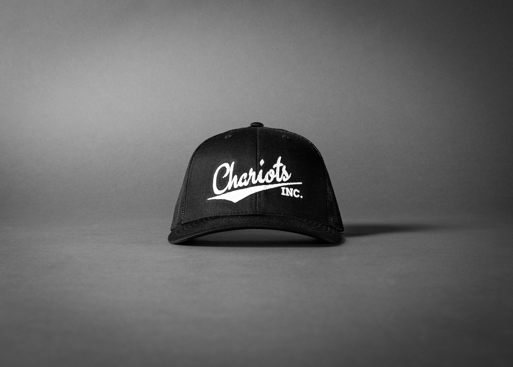 CHARIOTS INC (Black/White Embroidered Premium Trucker Hat)