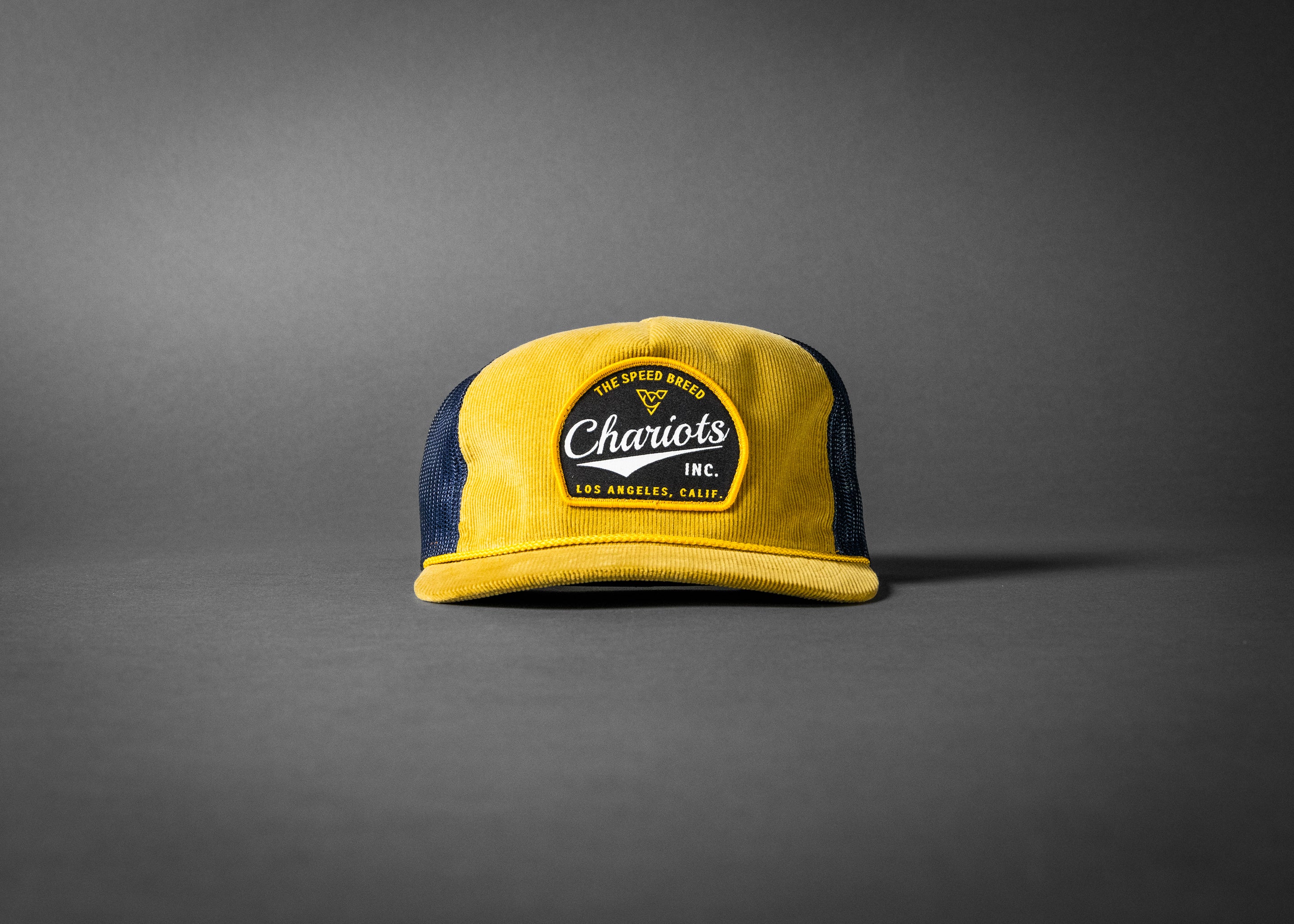 YELLOWJACKET (Amber Gold/Navy Corduroy Trucker Hat)