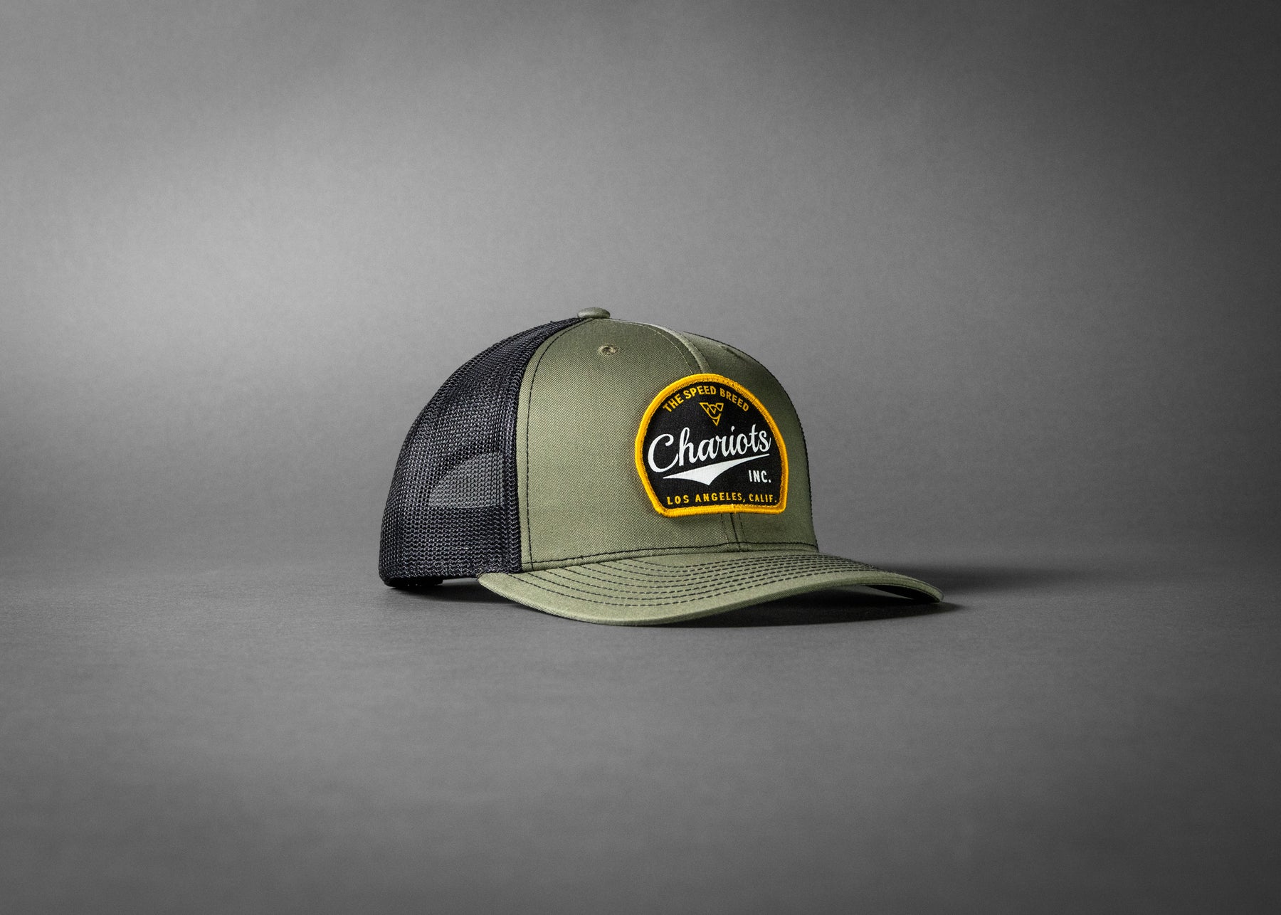 YELLOWJACKET (Loden Green/Black Premium Trucker Hat)