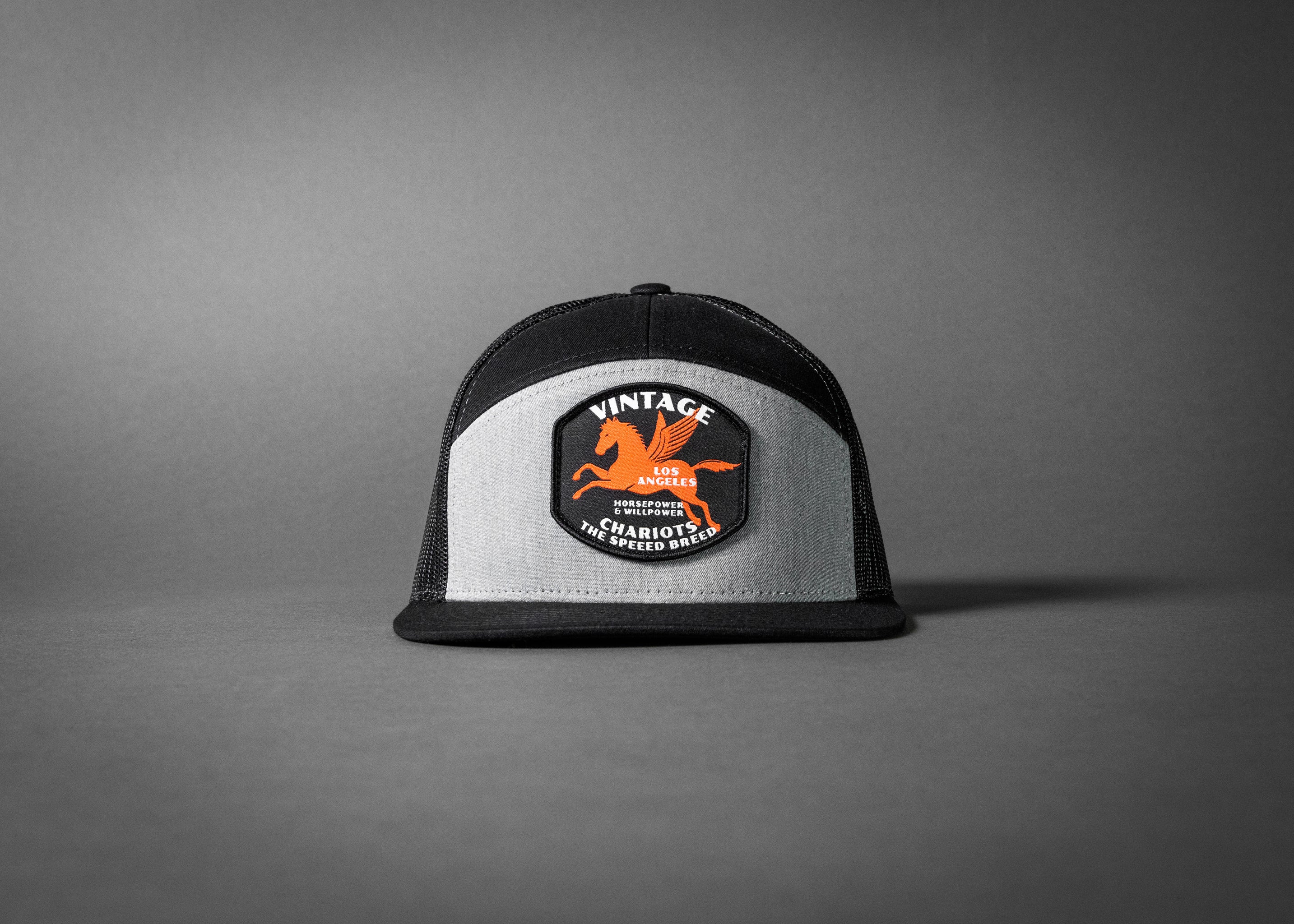 PEGASUS (Heather Grey/Black Premium 7-Panel Trucker Hat)