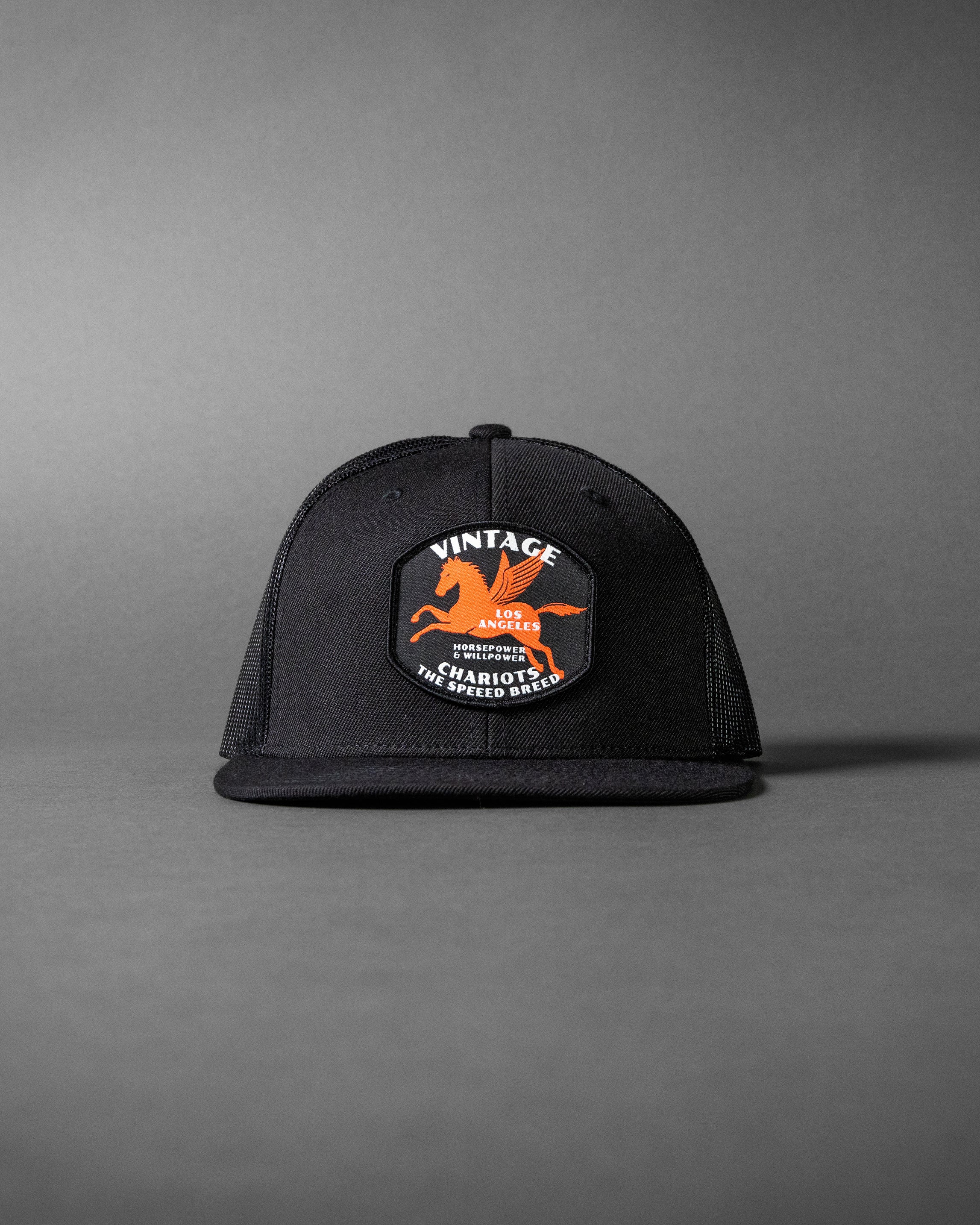 PEGASUS (Black Wool/Black Mesh Flat Bill Trucker Hat)