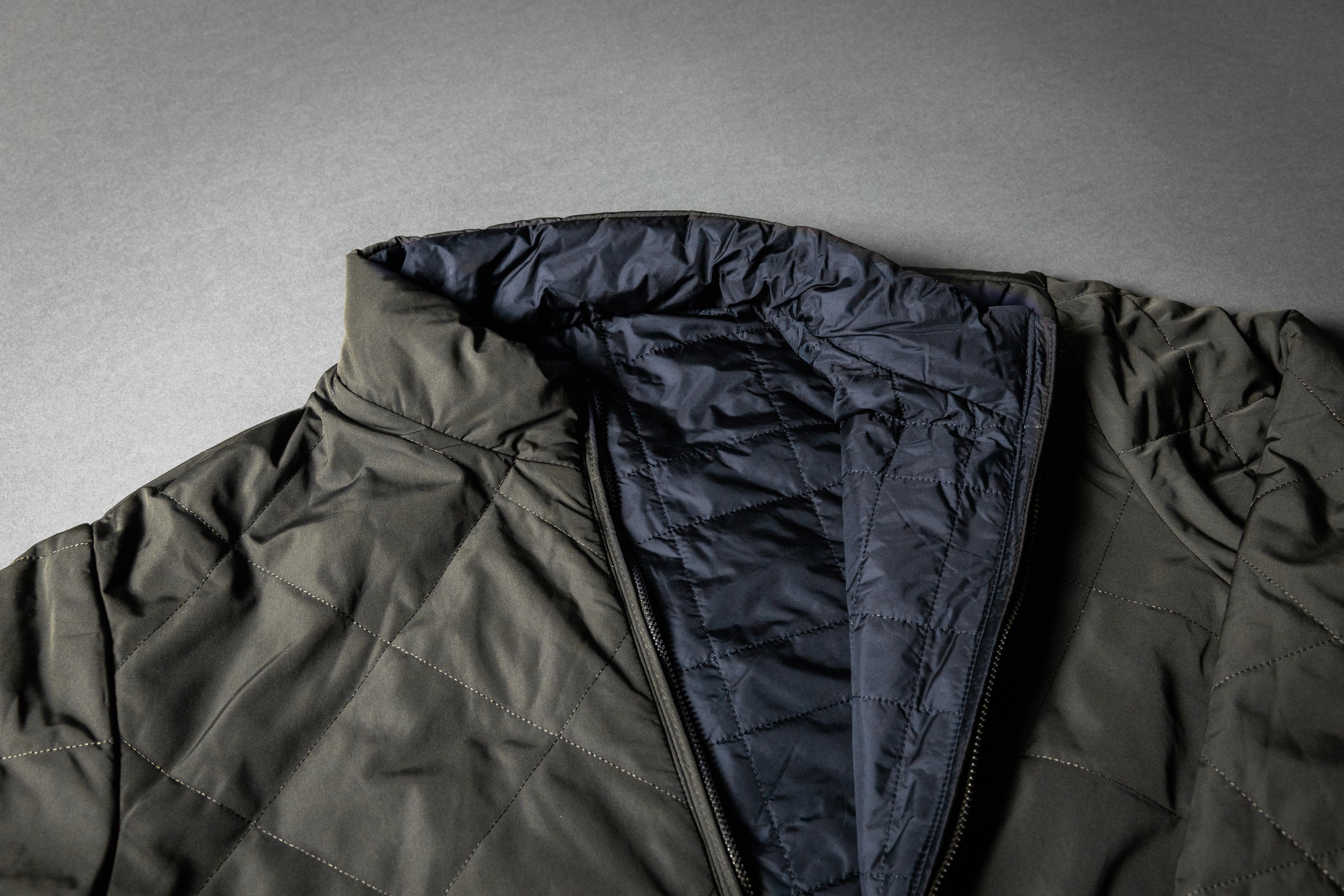 SPEED BREED PREMIUM REVERSIBLE QUILTED PUFFER JACKET (Dark Olive/Navy)