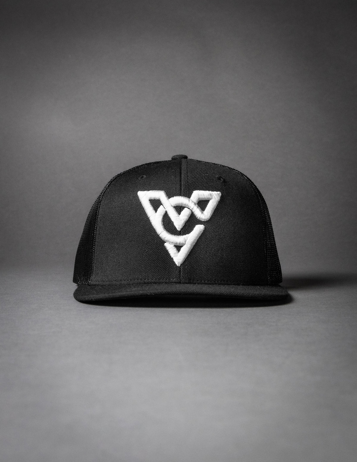 VC WOOL BLEND FLATBILL TRUCKER HAT (Black/Black/White Puff)