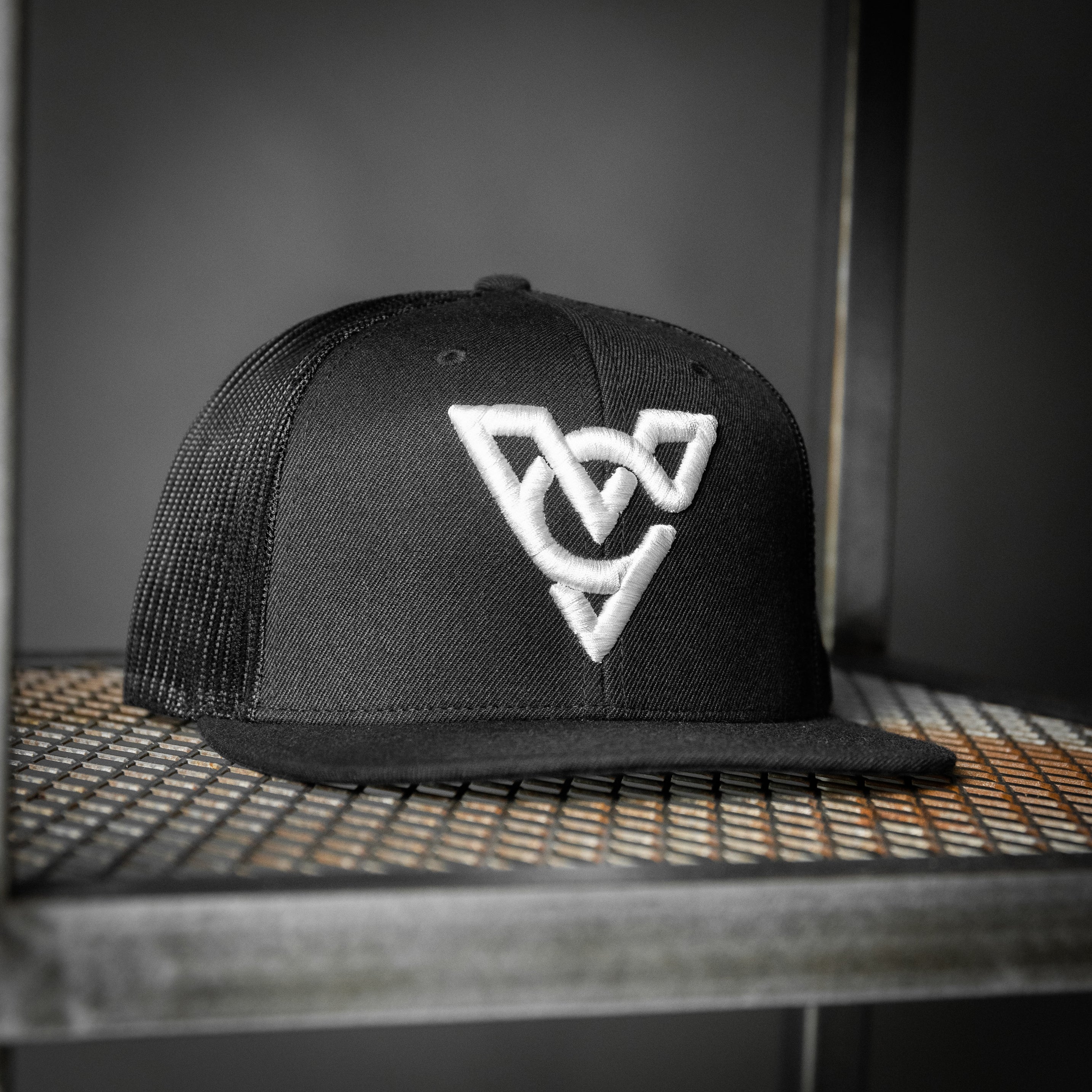 VC WOOL BLEND FLATBILL TRUCKER HAT (Black/Black/White Puff)